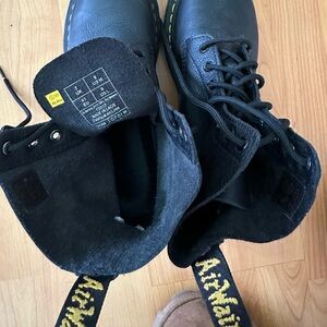 For sale: Dr. Martens boots in  good condition Available in  9 US .